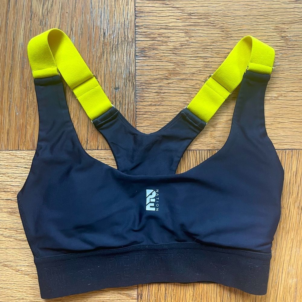 PE Nation Black Division Round Sports Bra w/ yellow adjustable straps, Sz XS EUC